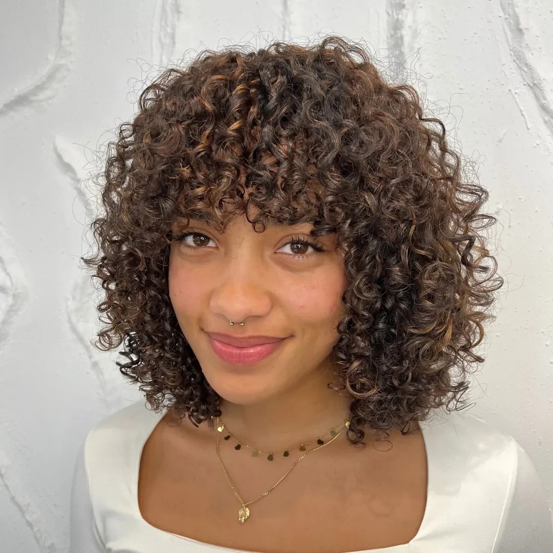 Bouncy Caramel Curls with Luminous Depth