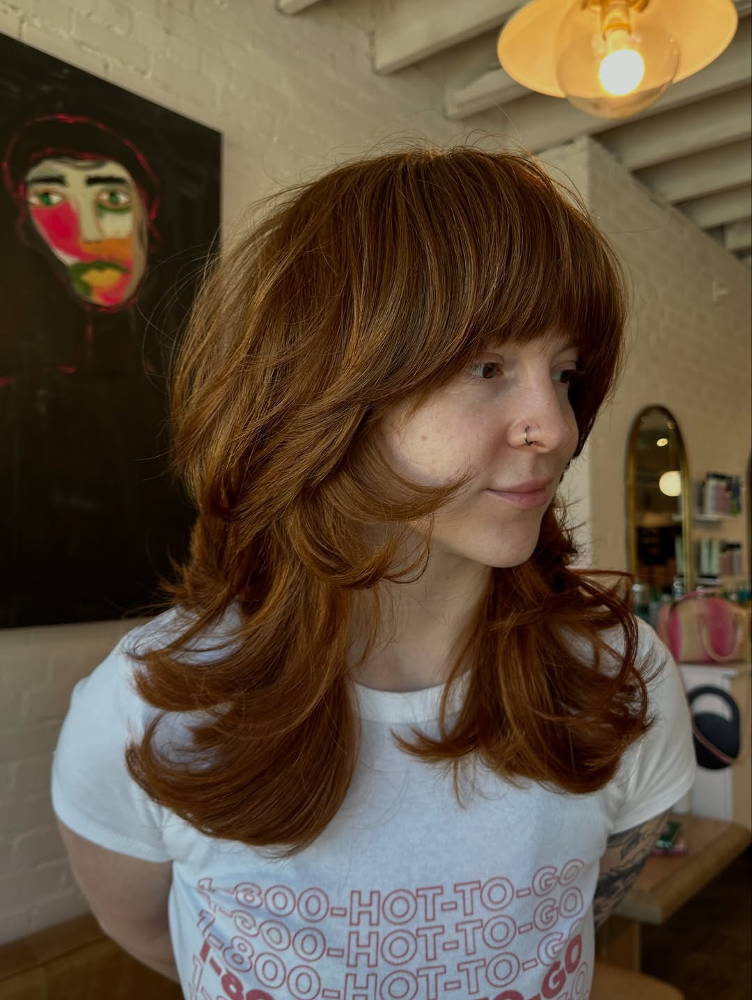 Copper Waves with Soft Side-Swept Bangs