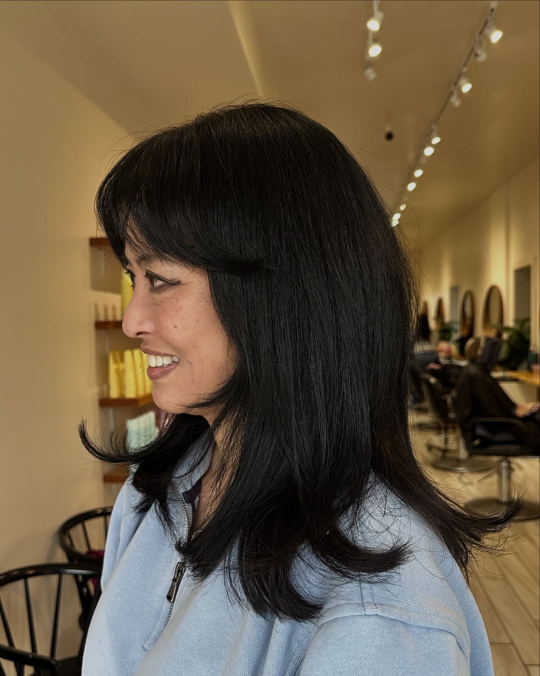 Elegant Raven Black Layered Cut with Subtle Flips