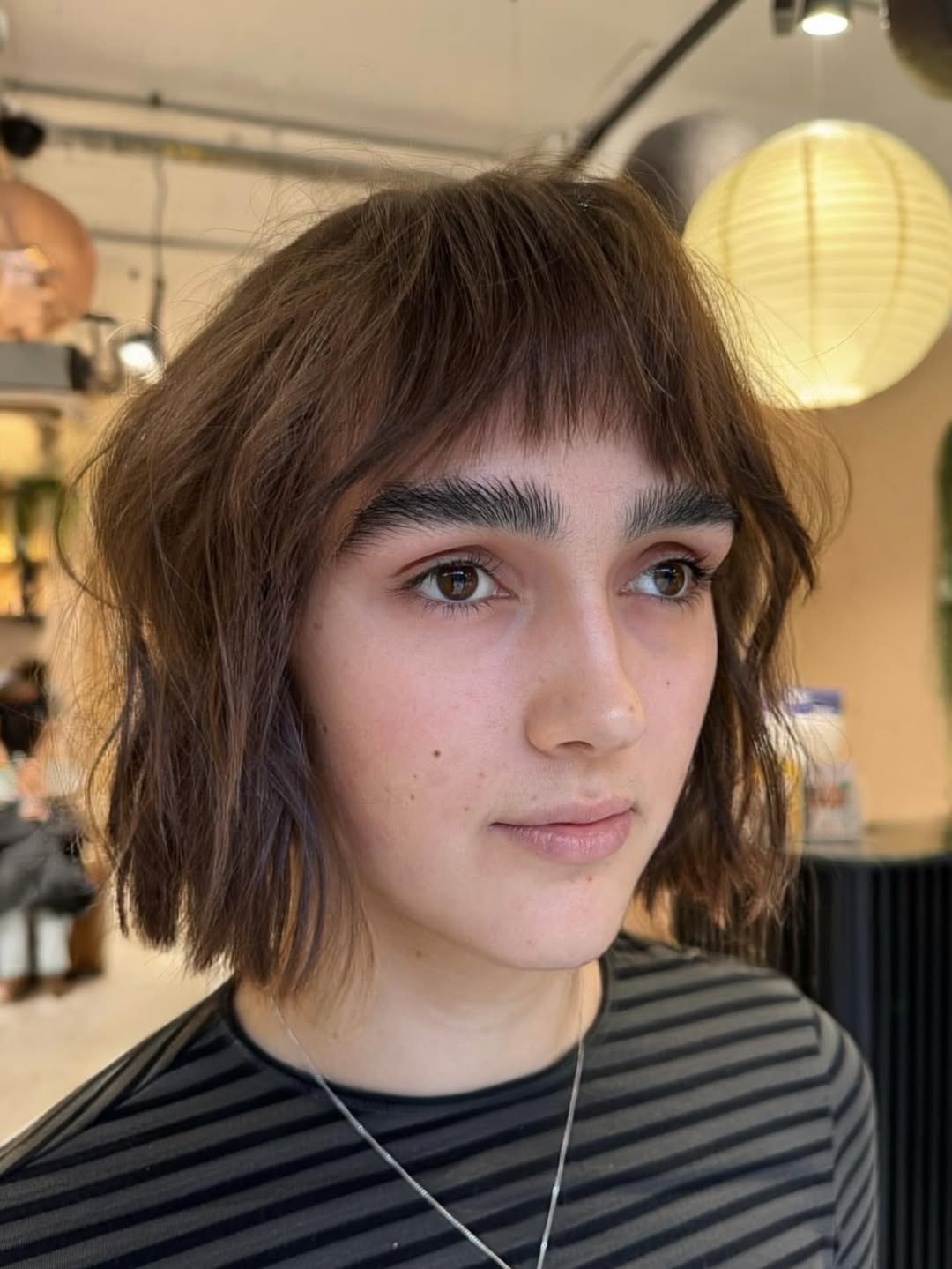 Sleek Espresso Chop with Cropped Fringe