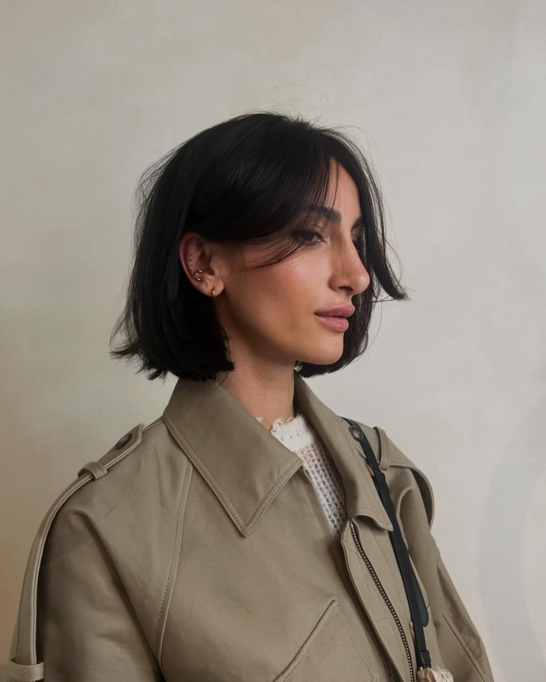 Sleek Onyx Side-Parted Bob with Soft Fringe