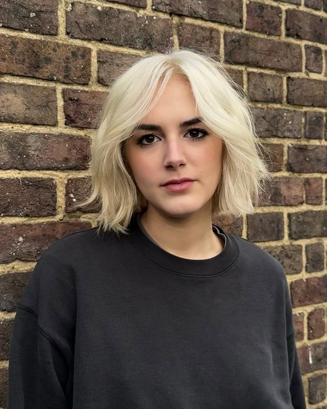 Subtle Beige Blonde Bob with Soft Texturing
