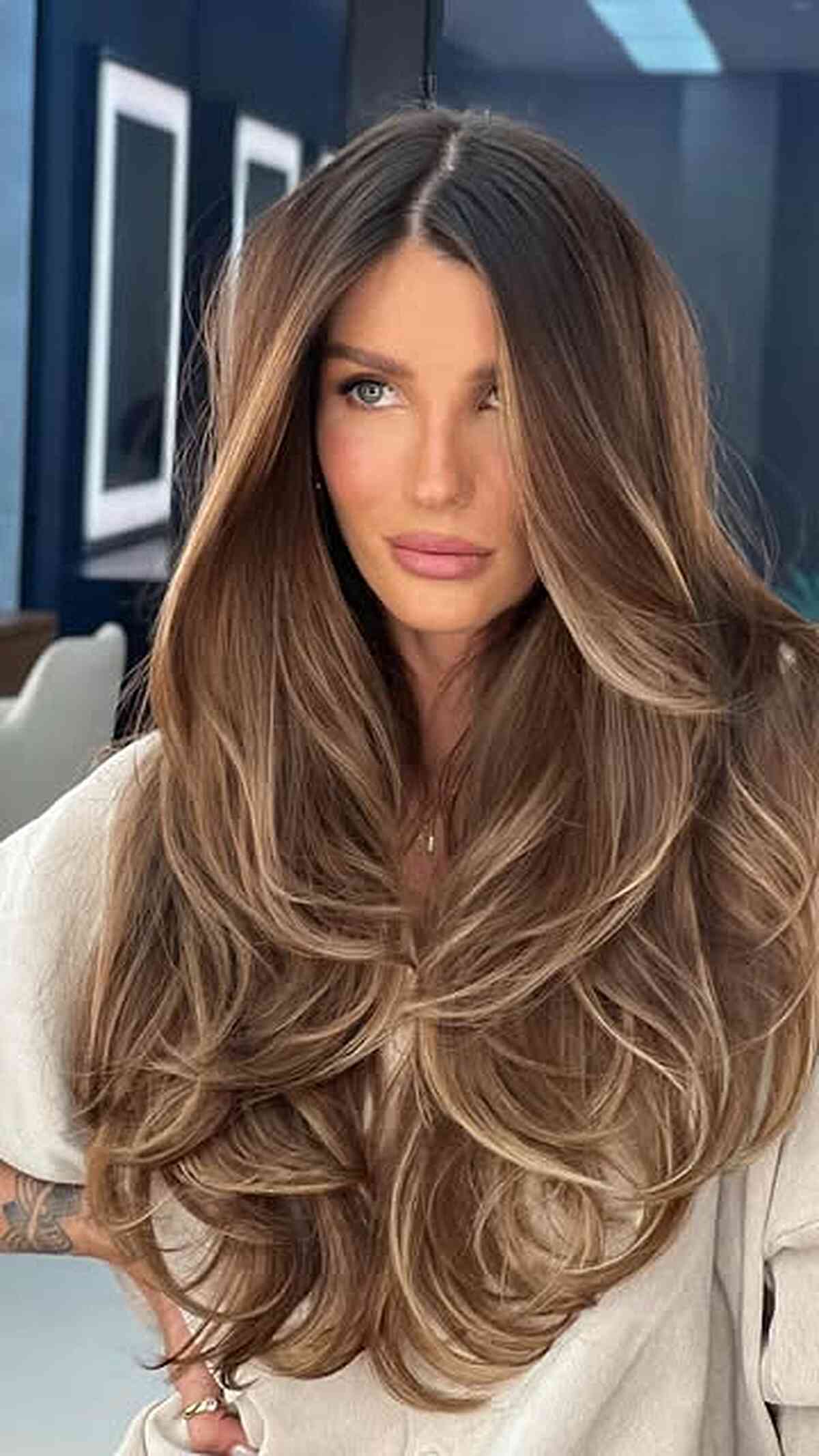 Long Butterfly Layers with Beige Brunette Highlights