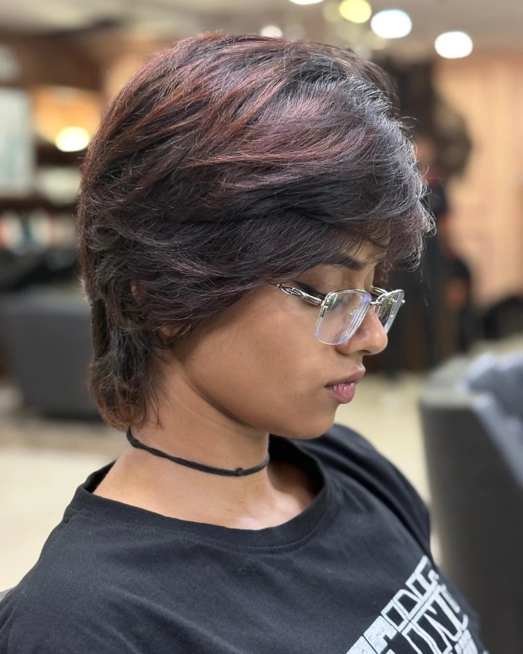 Burgundy-Tinted Asymmetrical Layered Bob