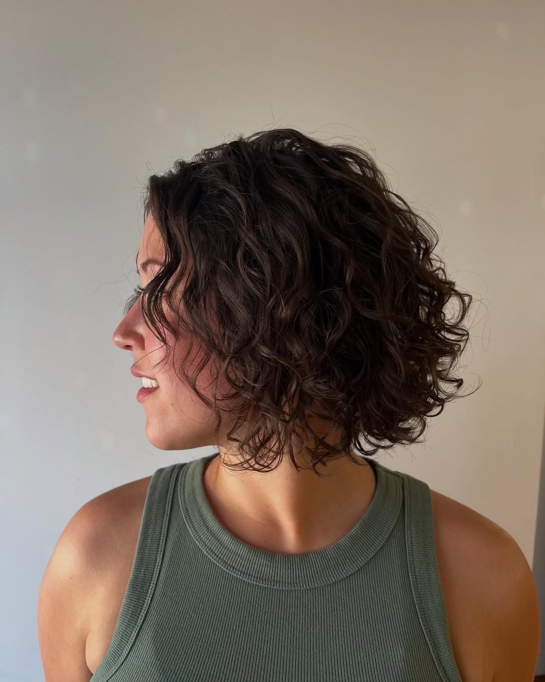 Charming Tousled Shoulder-Length Curl Cut