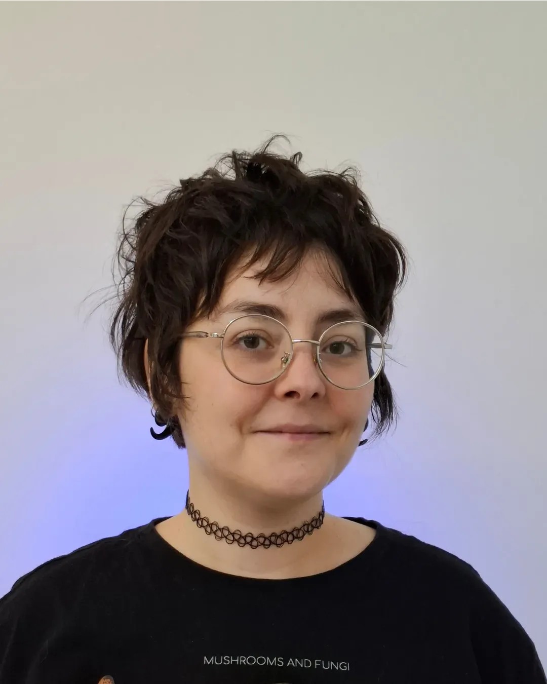 Choppy Jet-Black Pixie with Soft Fringes