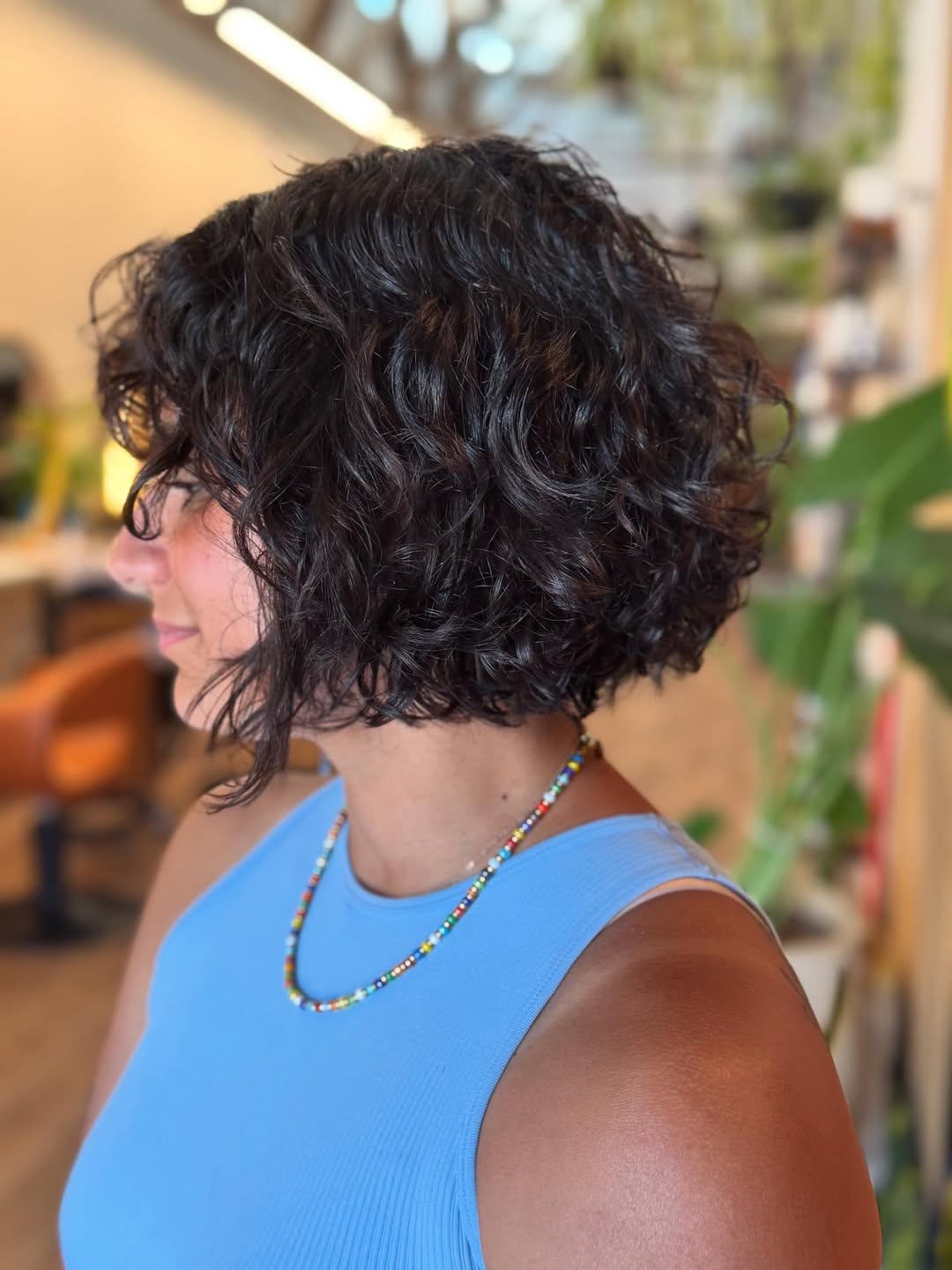 Dynamic Jaw-Length Curly Bob with Natural Sheen