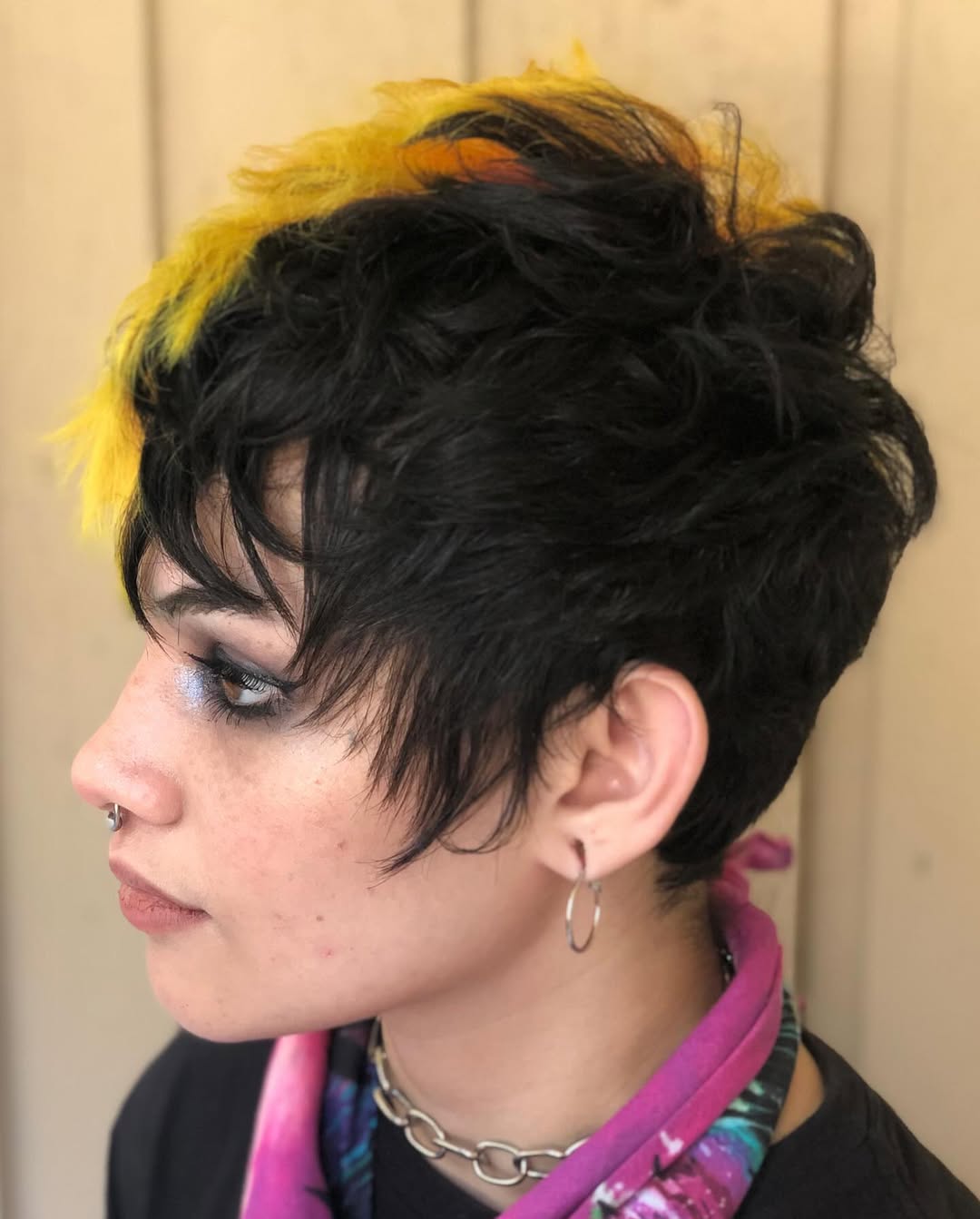 Edgy Contrast Pixie with Bold Yellow Highlights
