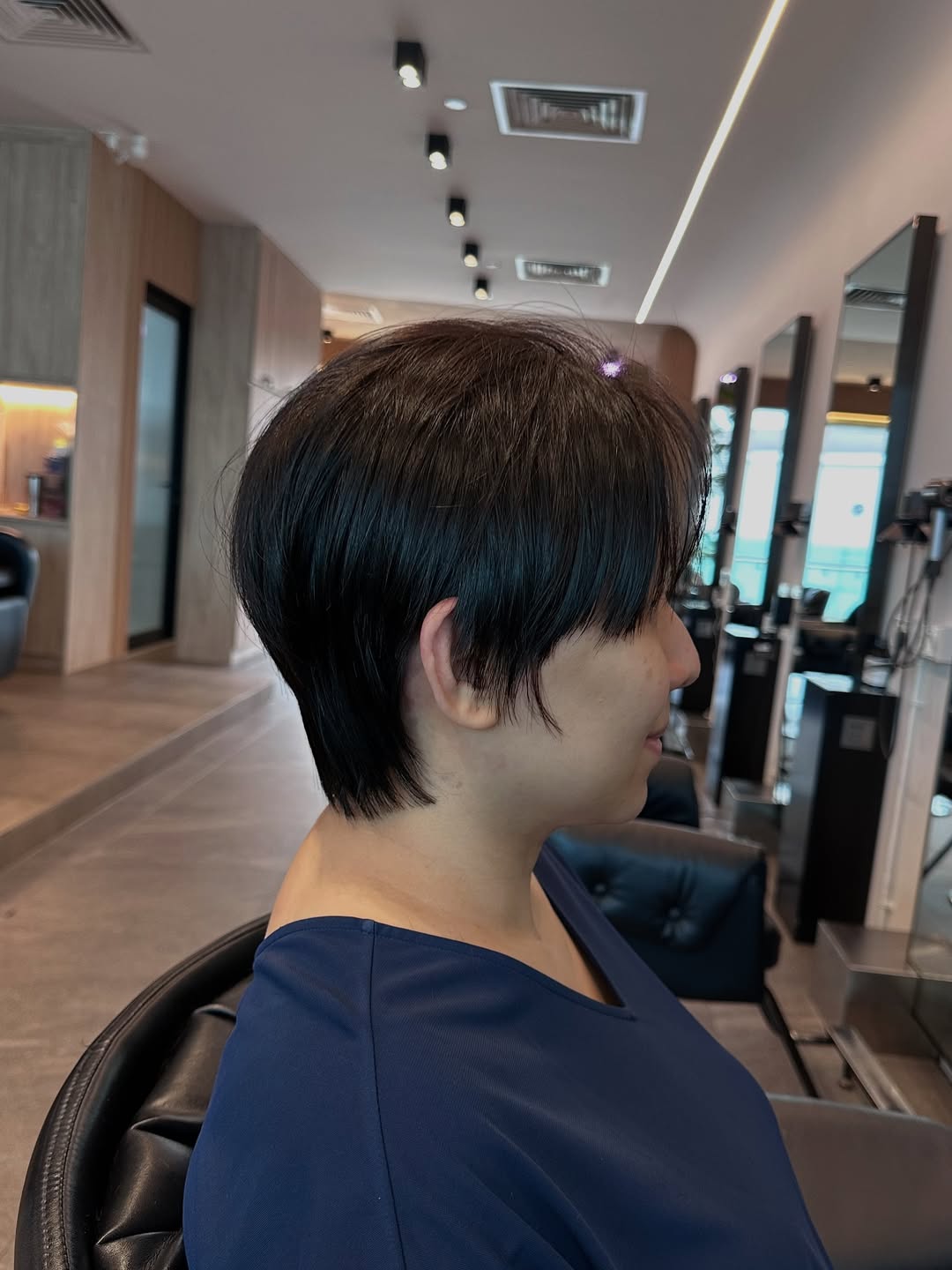 Modern Deep Side-Parted Bob with Tapered Nape