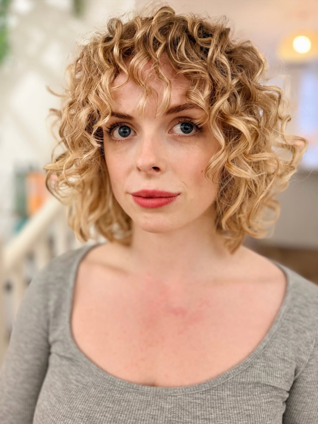 Perfectly-Defined Golden Blonde Curly Bob