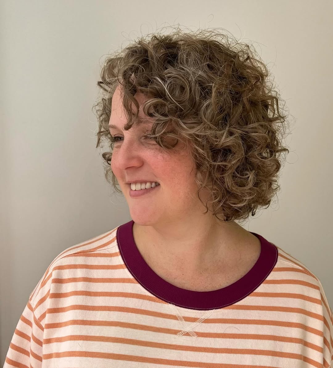 Playful Short Curly Bob with Natural Highlights
