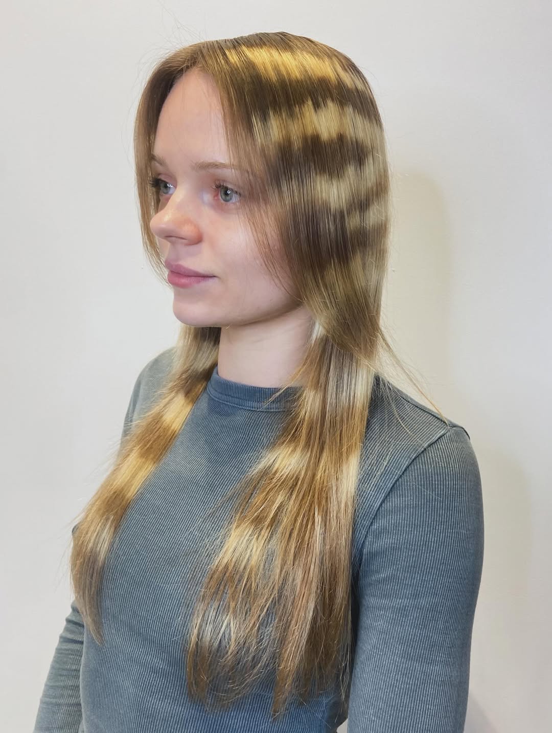 Sleek Blonde Balayage with Chestnut Streaks