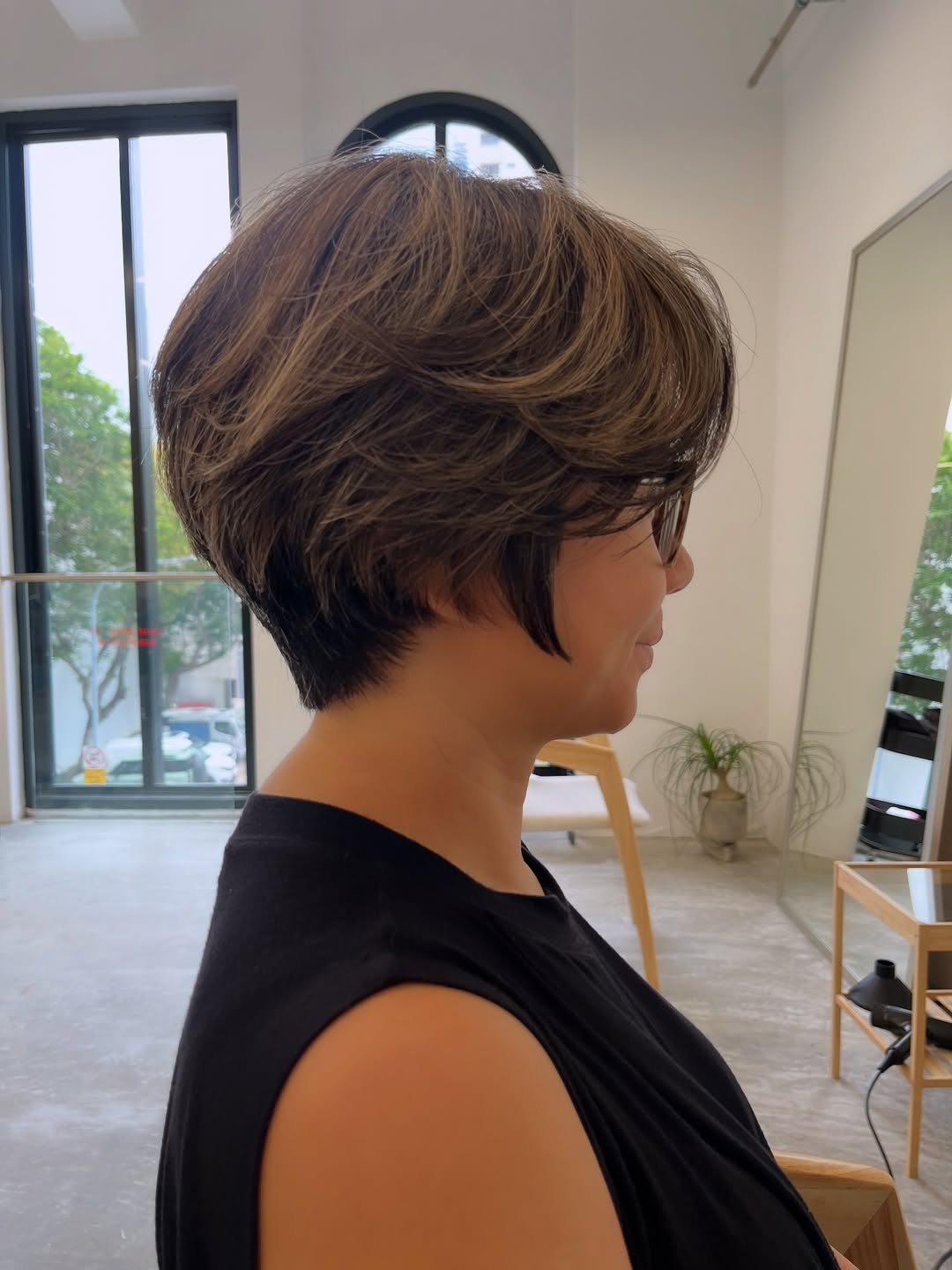 Sleek Caramel Toned Stacked Bob with Textured Layers
