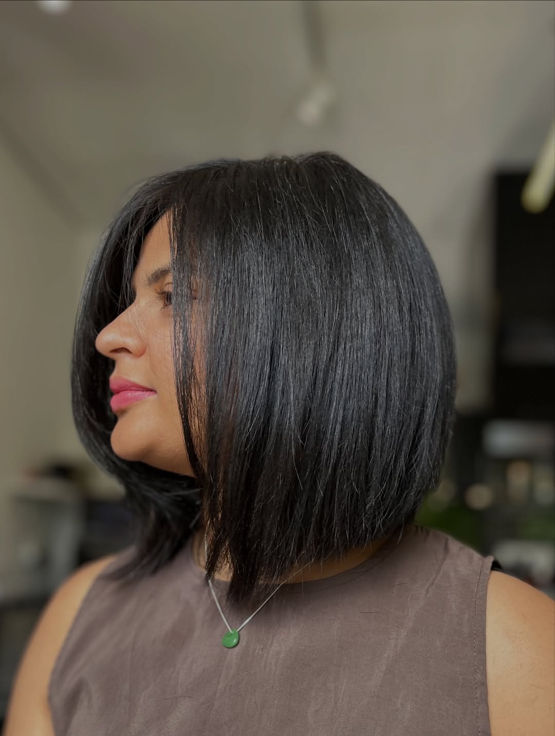 Sleek Jet-Black Angled Bob with Subtle Graduation