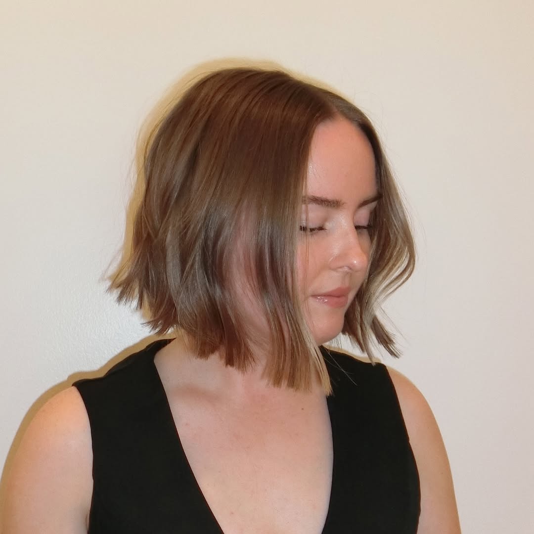 Soft Caramel Highlights on Blunt Angled Bob