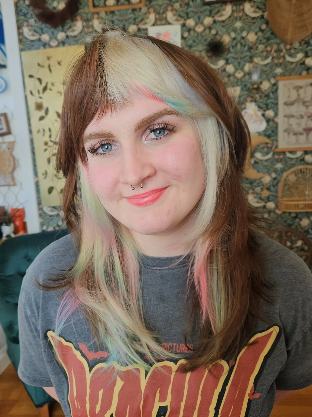 Soft Pastel Accents on Layered Mid-Length Hair