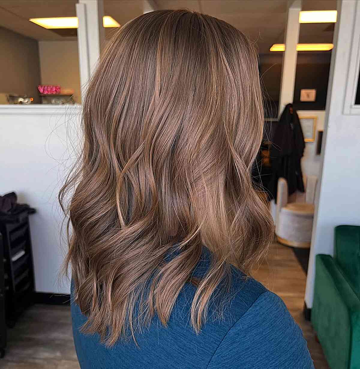 Soft Wavy Mid-Length Haircut with Subtle Layers
