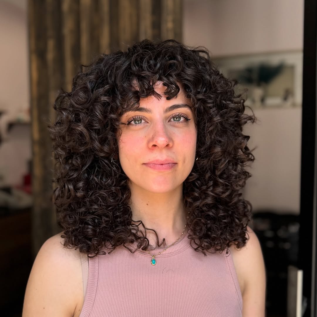 Softly-Tousled Medium-Length Curly Cut