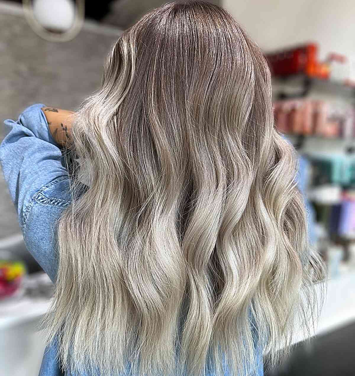 Stunning Platinum Blonde Balayage with Soft Waves