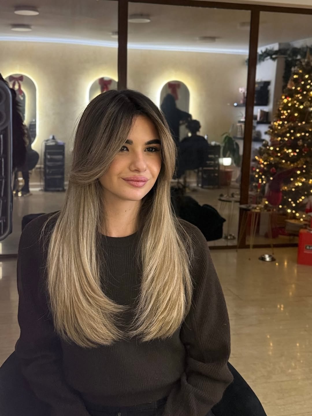 Subtle Blonde Balayage with Feathered Layers
