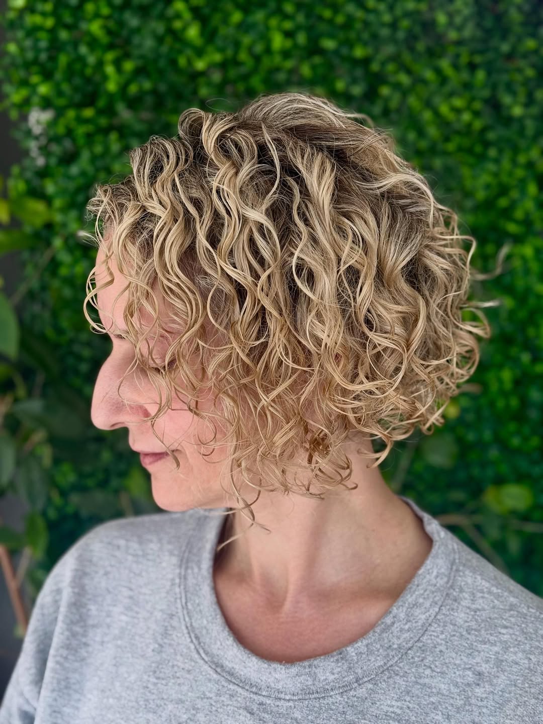 Subtle Golden Blonde Curly Lob