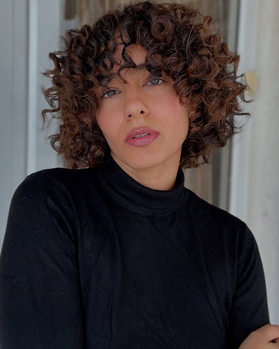 Textured Cinnamon Swirl Curls with Layered Bob