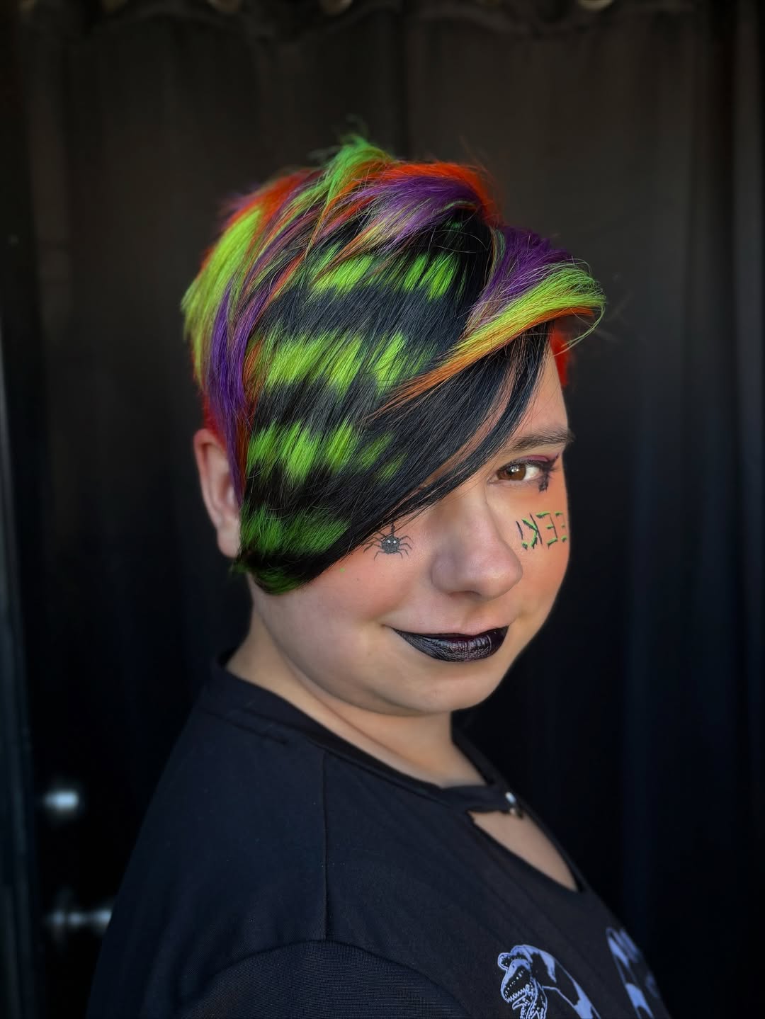 Vivid Neon Streaks on Asymmetrical Pixie Cut