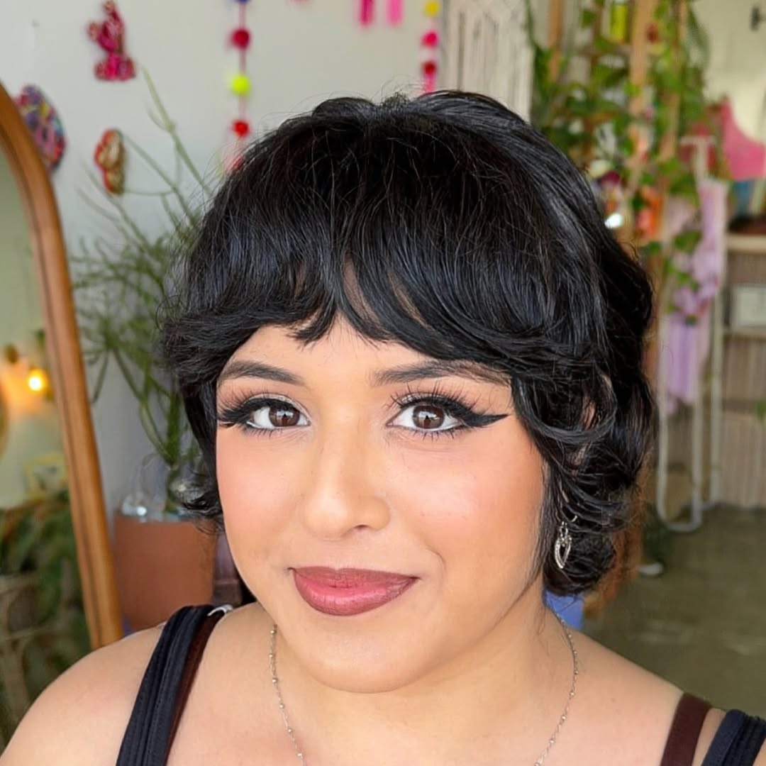 Chic Black Bob with Soft Curled Bangs