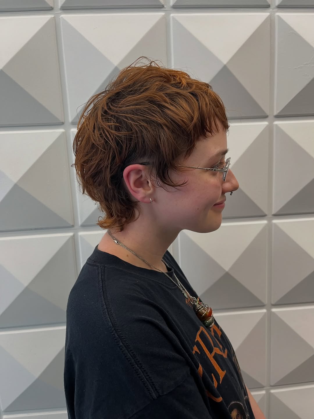 Dynamic Auburn Tousled Pixie with Volume