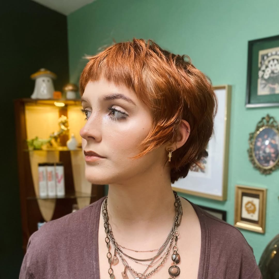 Lively Copper Tousled Pixie with Artistic Flair