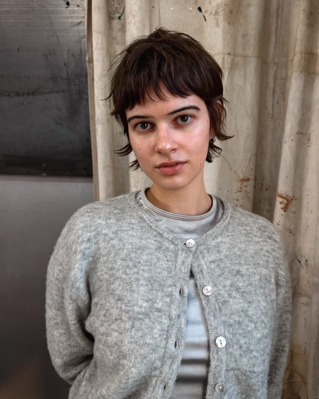 Playful Brunette Cropped Shag with Feathered Bangs