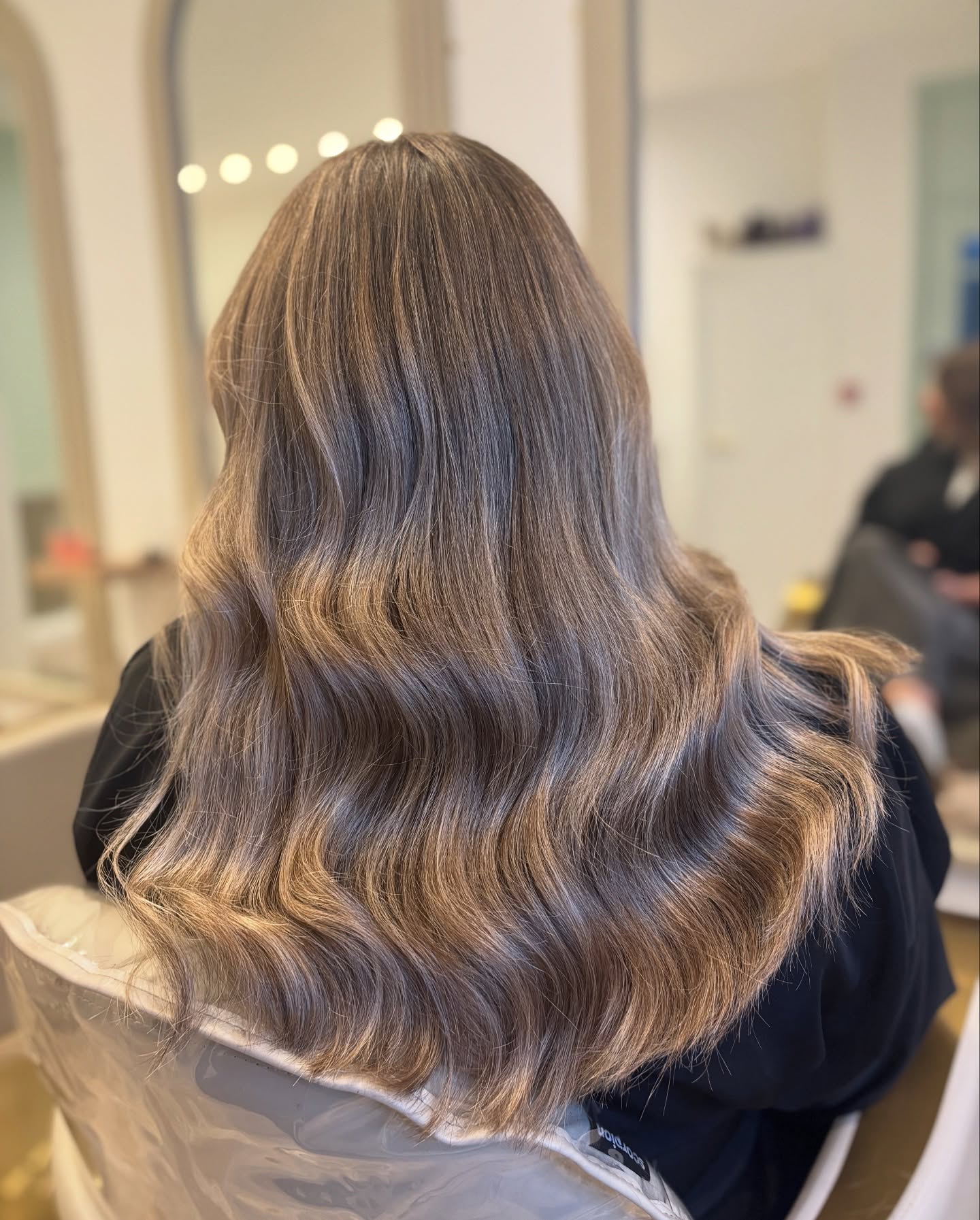 Elegant Soft Beige Waves with Luxurious Shine