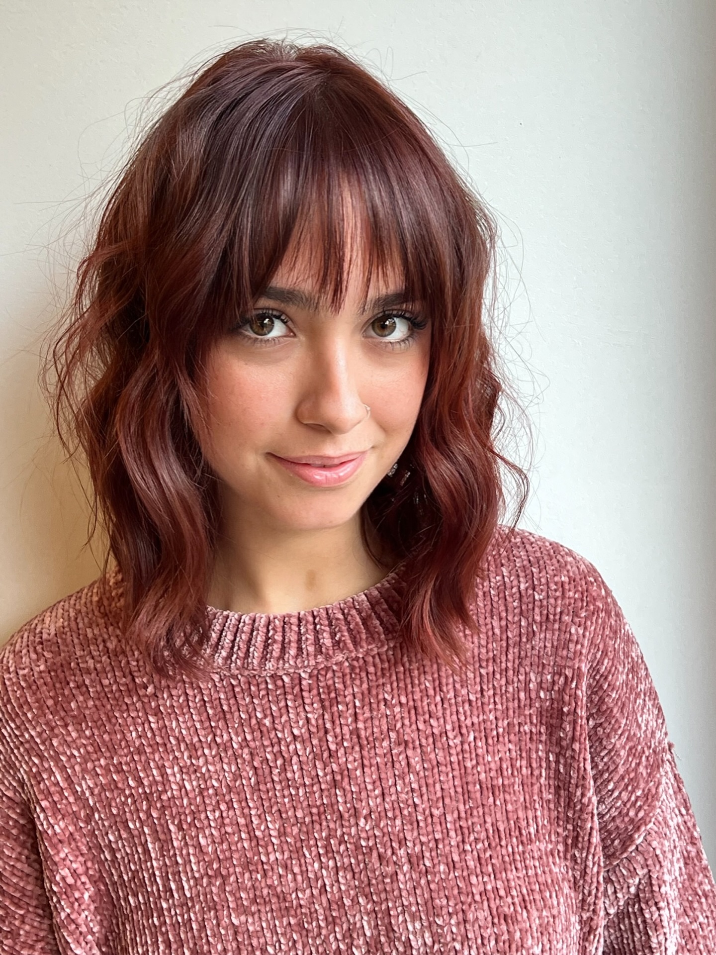 Burgundy Shoulder-Length Cut with Wispy Fringe