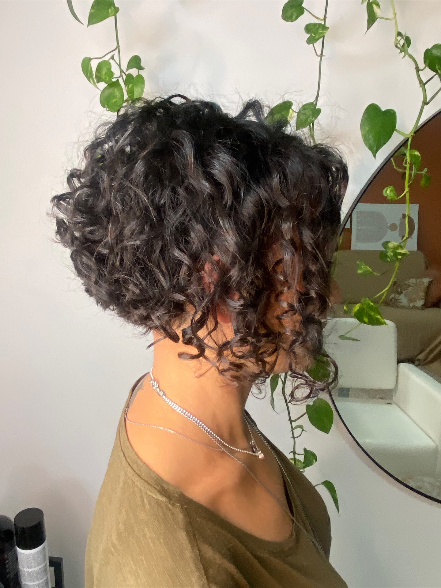 Curly Voluminous Bob with Natural Highlights