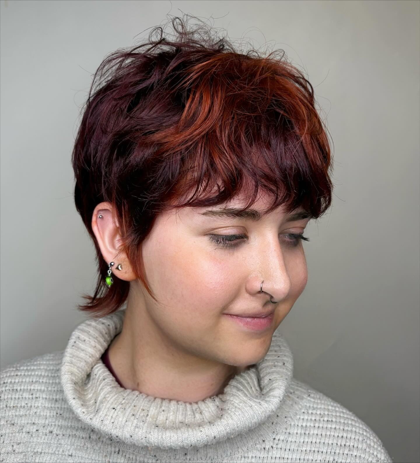 Dynamic Auburn Tousled Shag with Soft Bangs