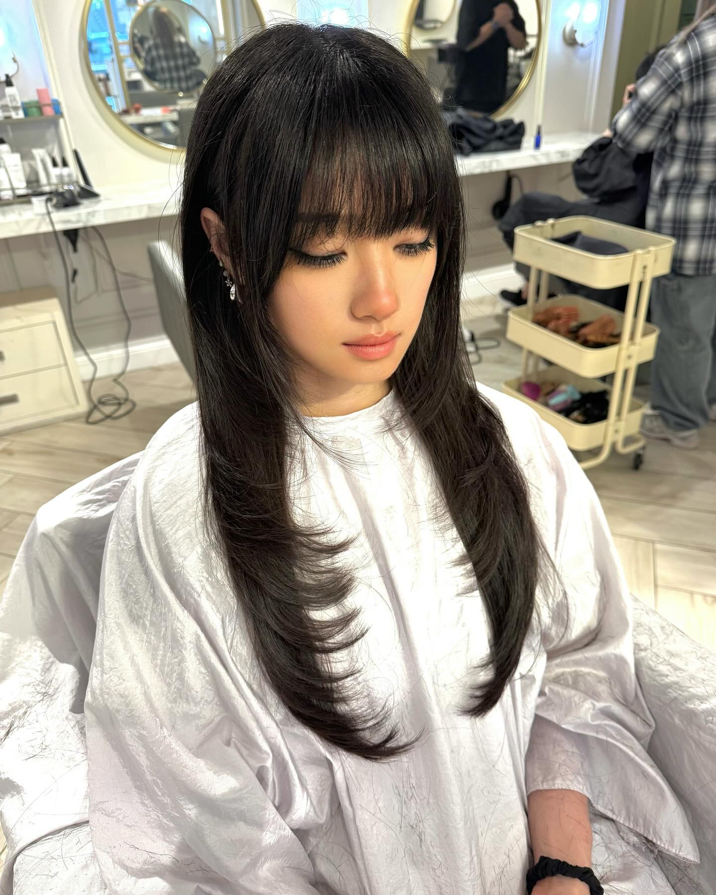 Feathered Black Waves with Soft Blunt Bangs