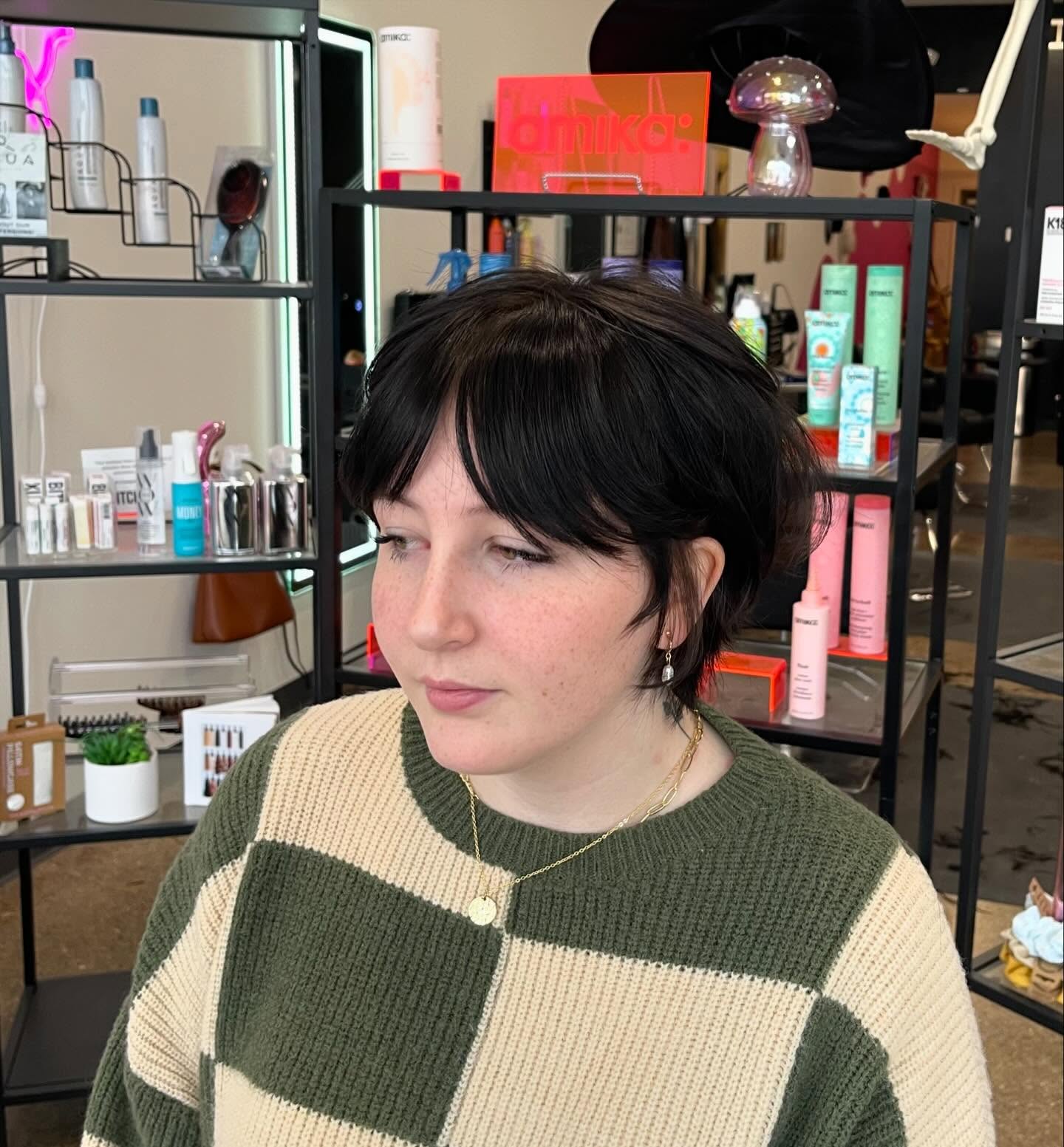 Jet-Black Choppy Bob with Wispy Bangs