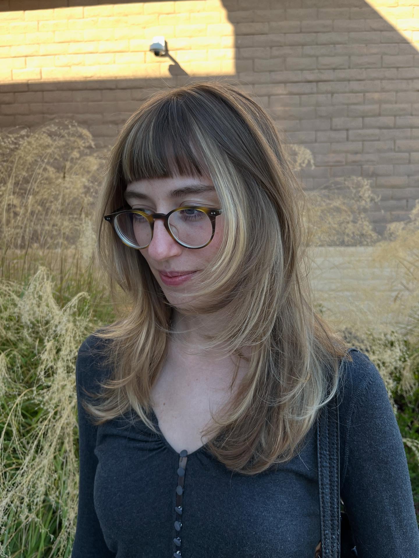 Modern Feathered Bangs with Soft Ombre Highlights