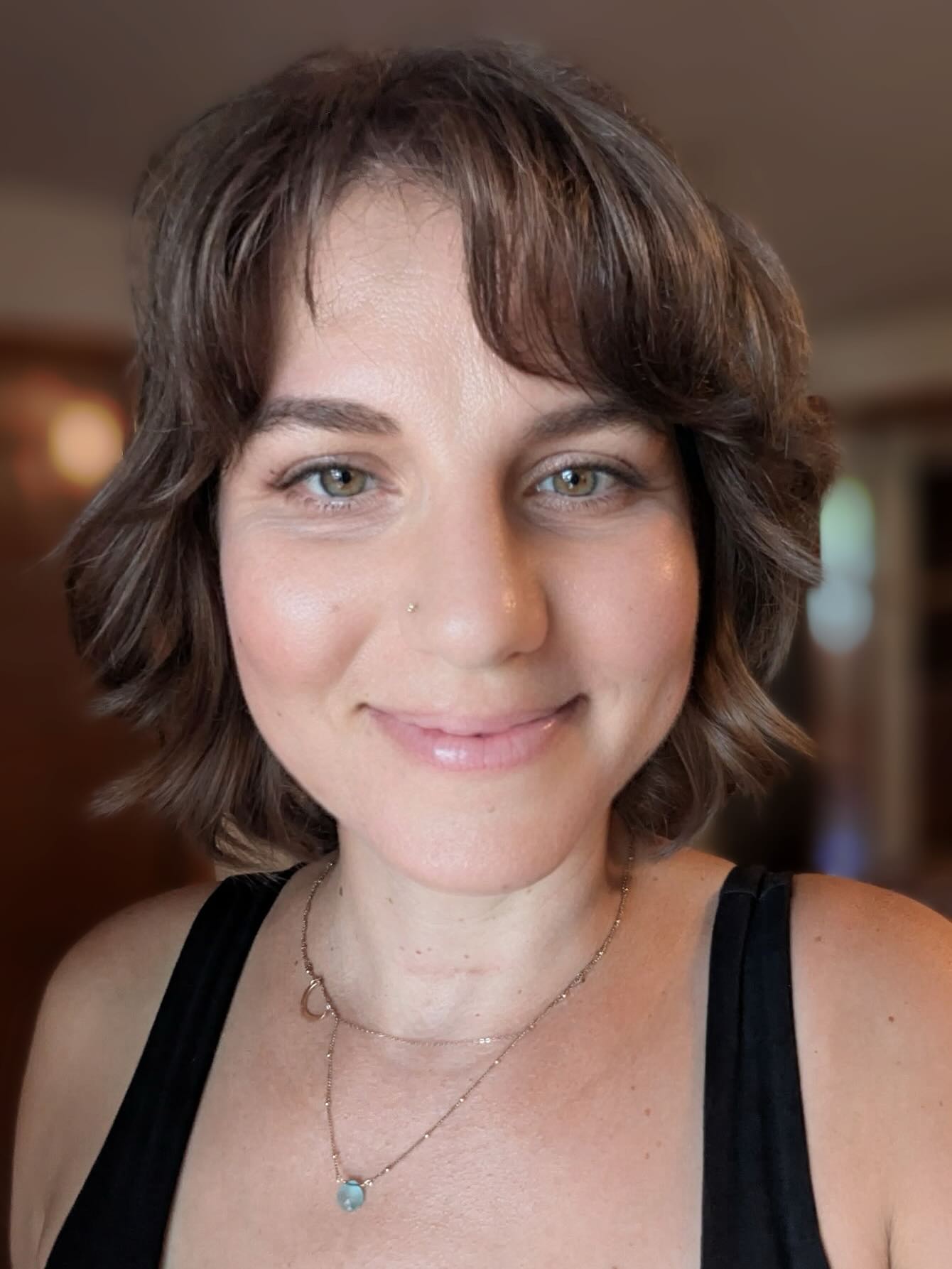 Softly Tousled Brunette Shag with Swooping Bangs