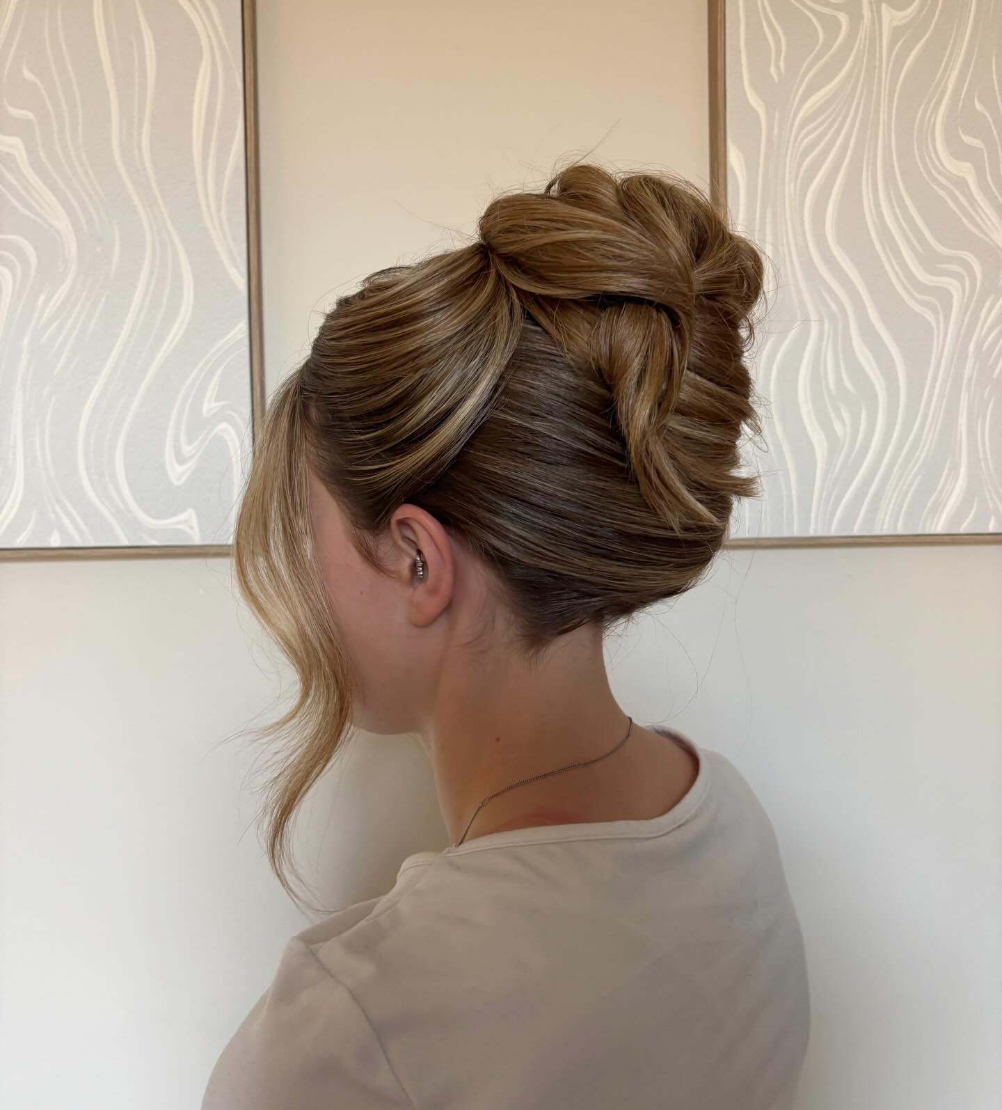 Twisted Blonde Updo with Elegant Strands
