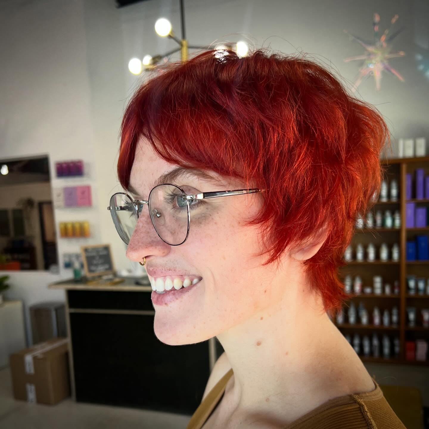 Vibrant Crimson Tousled Pixie with Subtle Texture