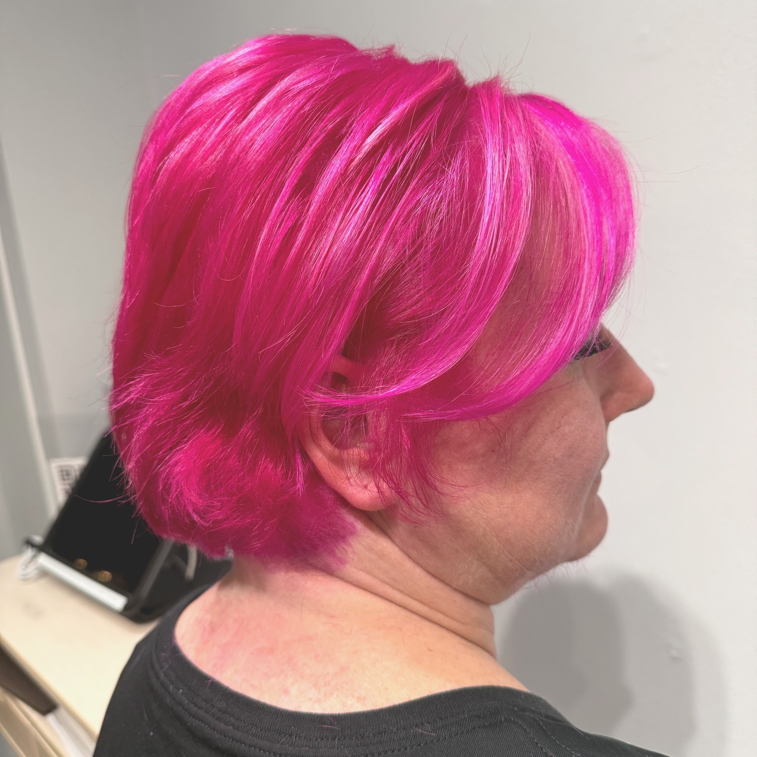 Vibrant Pink Layered Bob with Textured Waves
