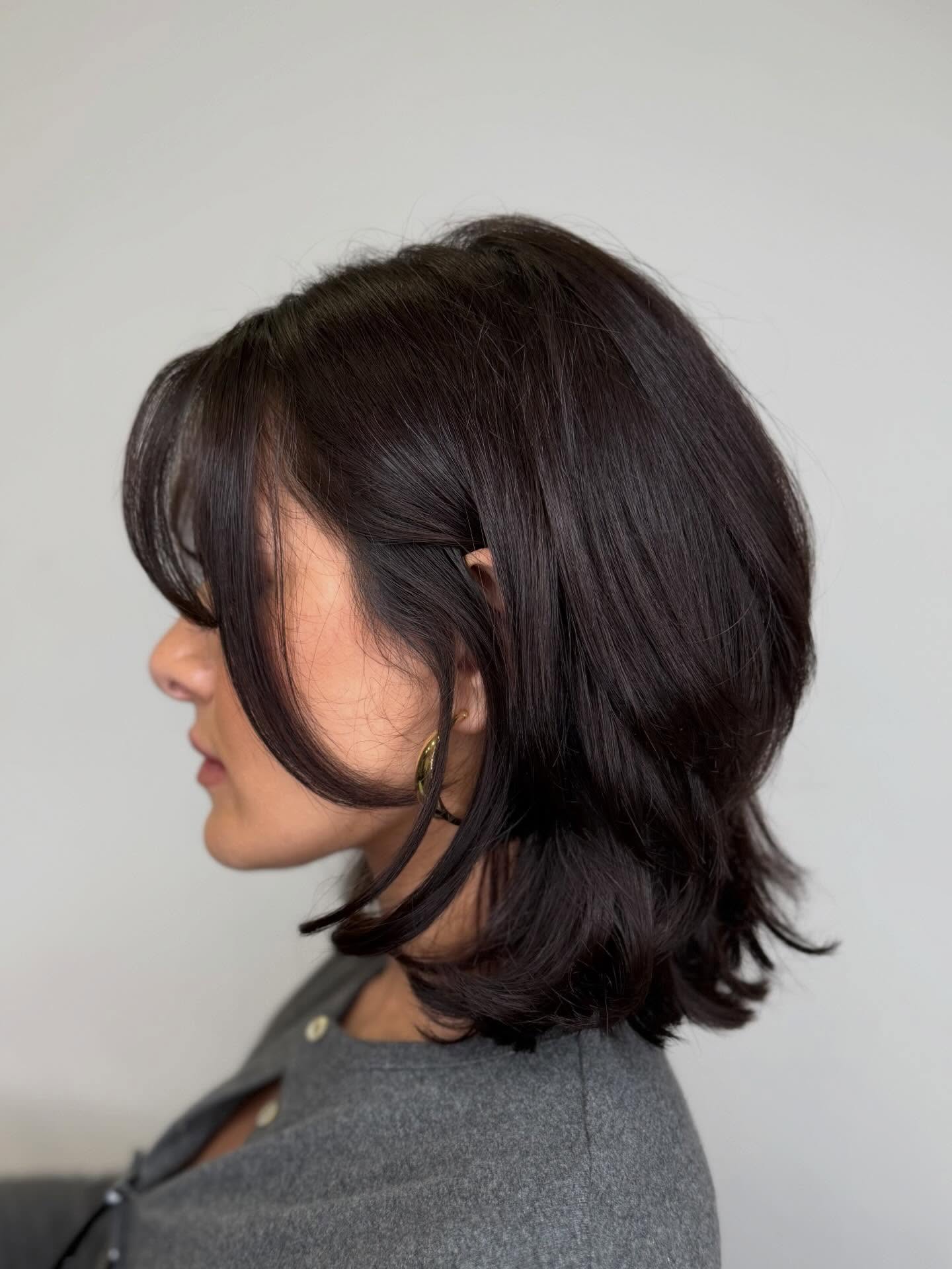 Chic Espresso Tousled Bob with Side-Swept Bangs