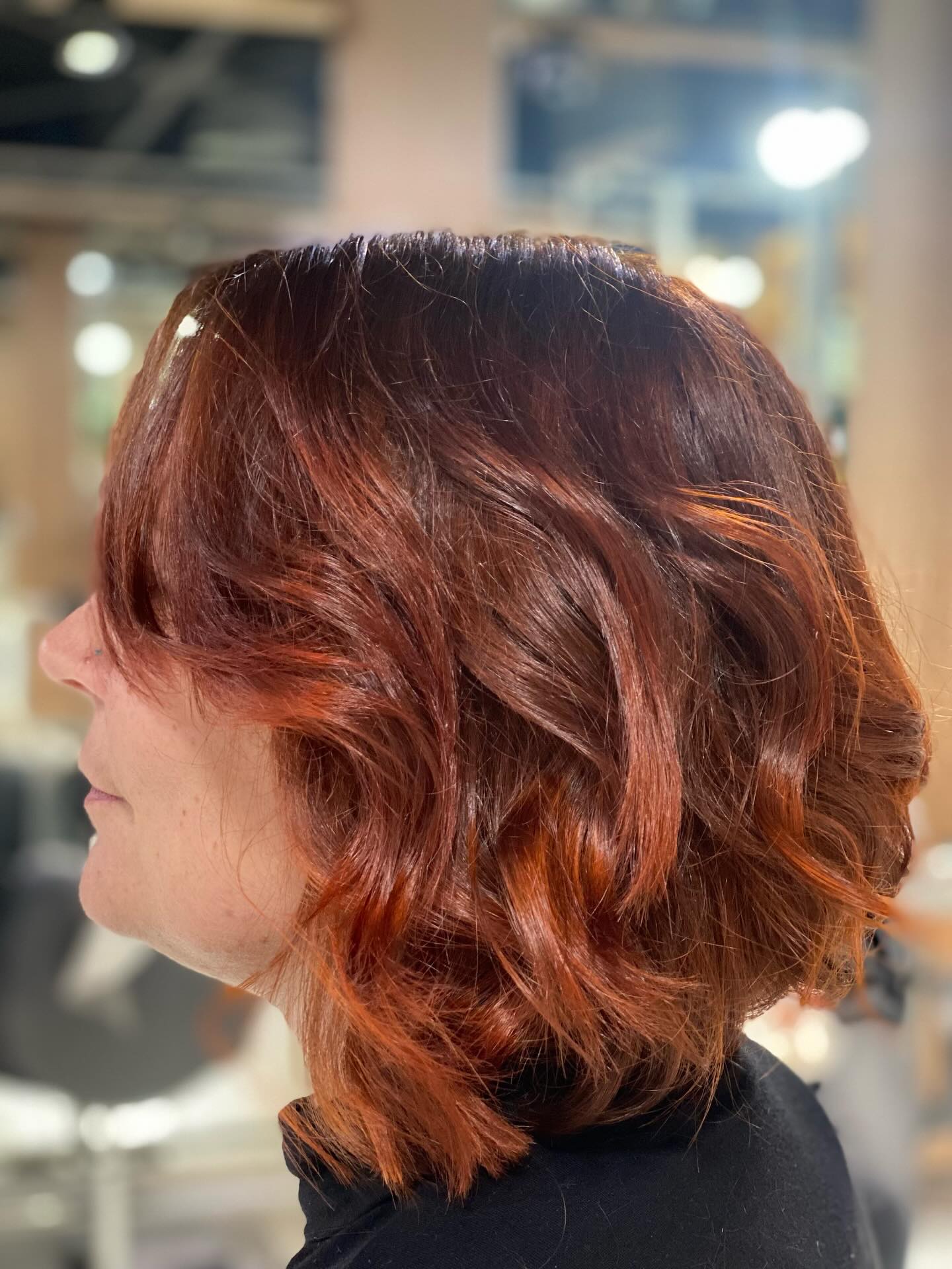 Copper-Toned Wavy Bob with Subtle Layers