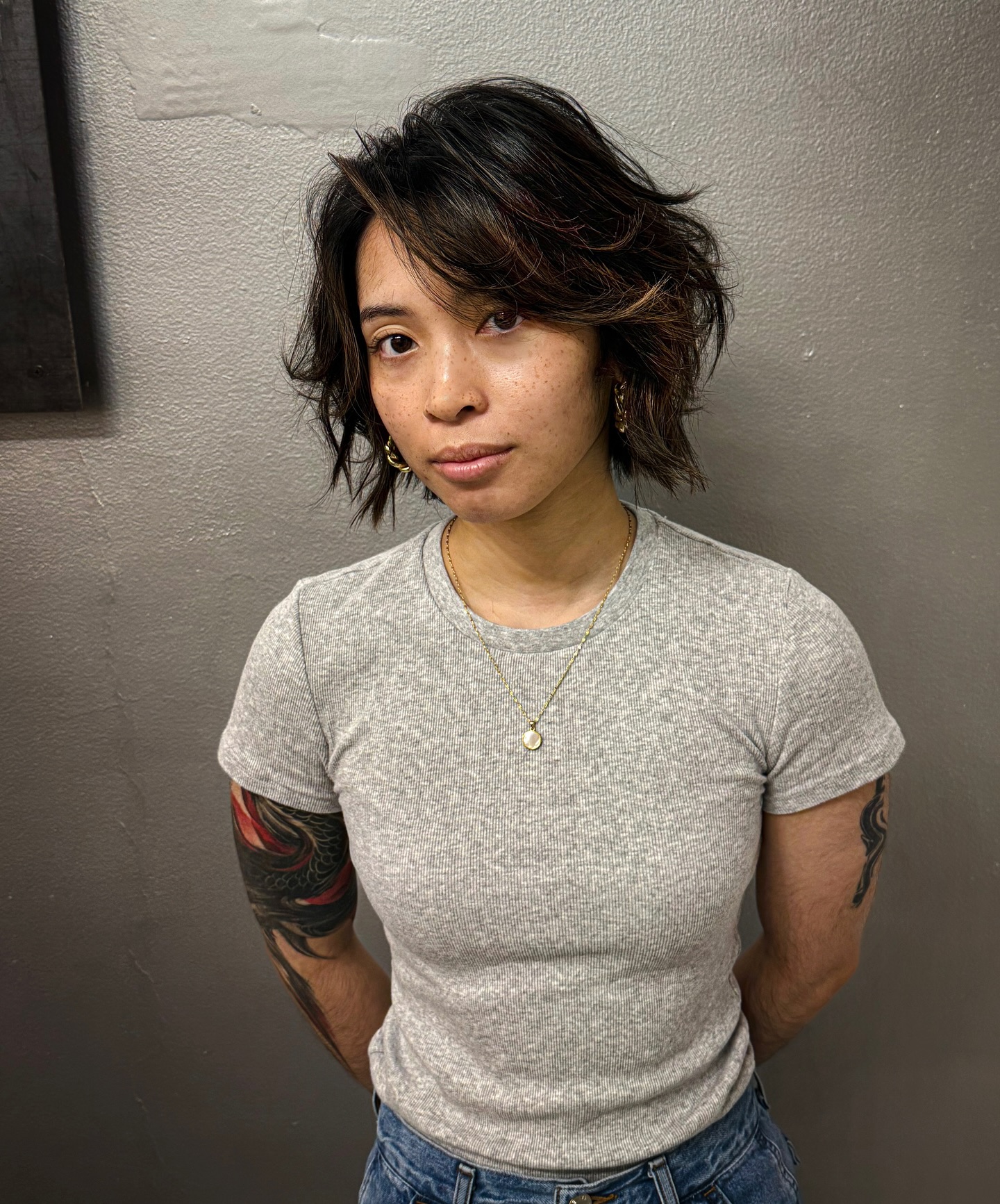 Edgy Textured Layered Bob with Chestnut Highlights