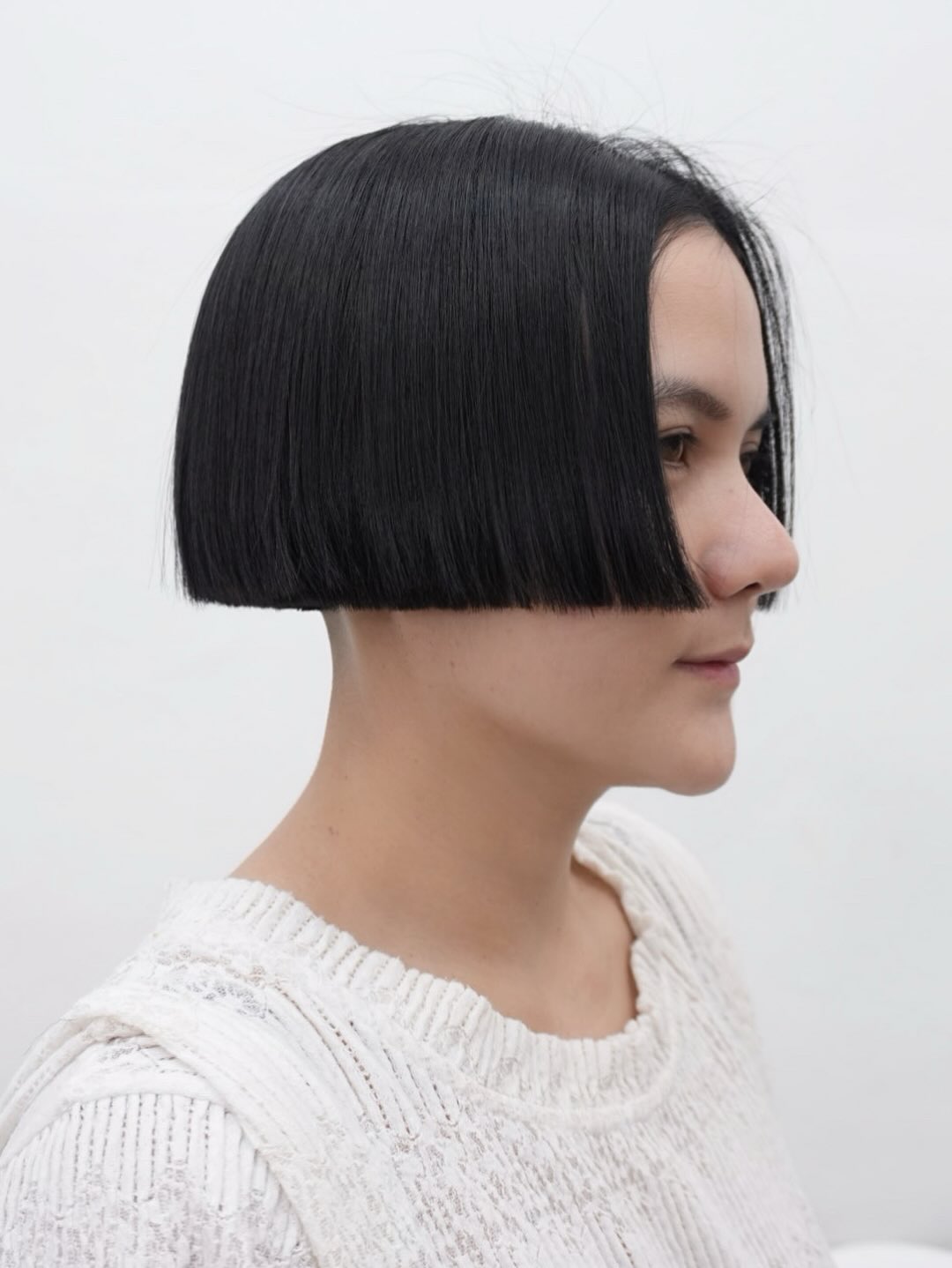 Fashion-Forward Jet-Black Precision Bob