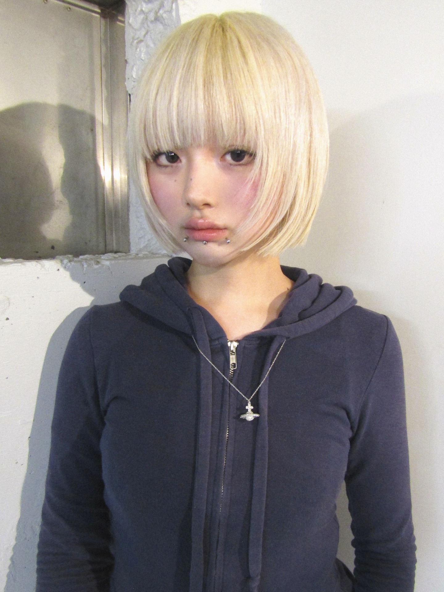 Light Blonde Rounded Bob with Full Bangs