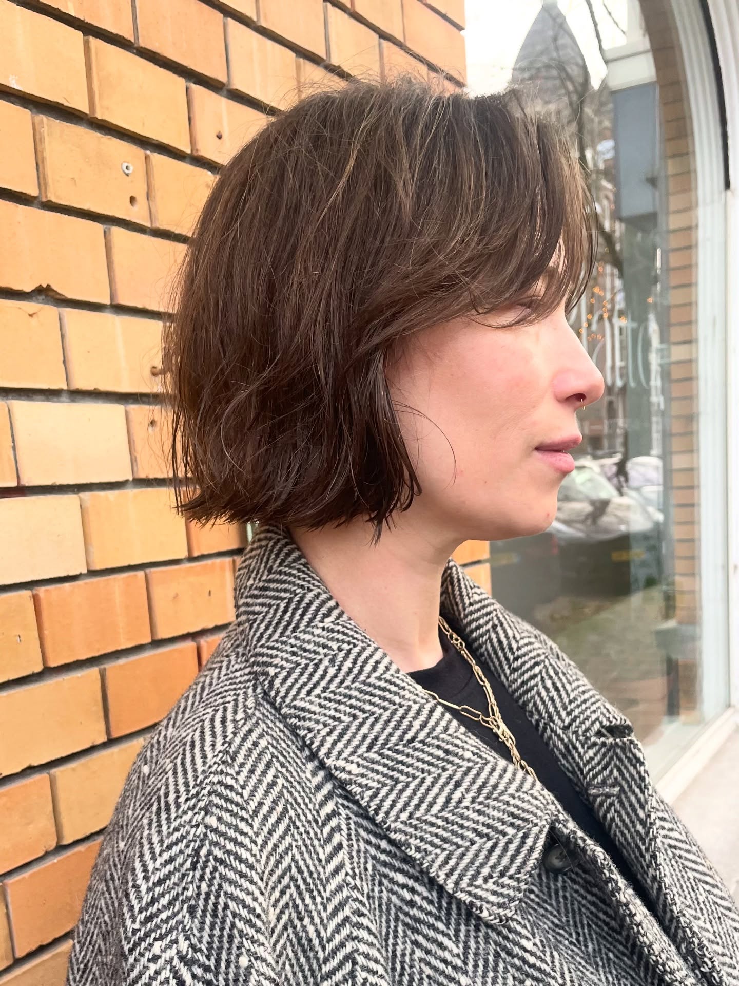 Natural Brown Tousled Bob with Side-Swept Bangs
