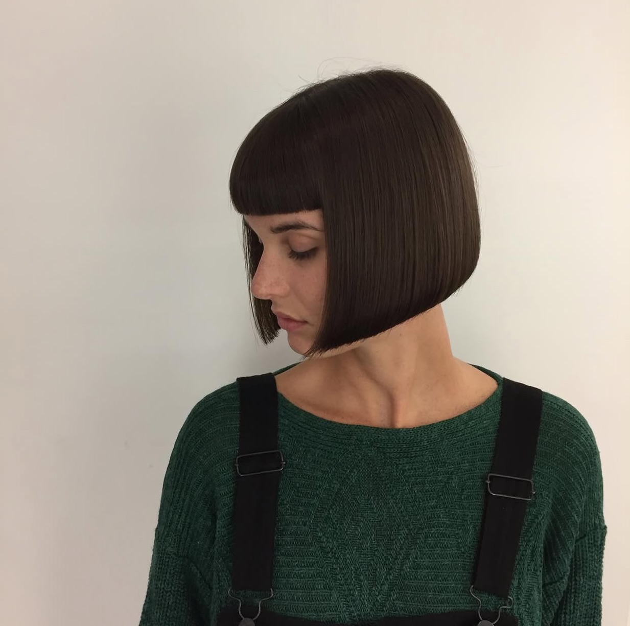 Sleek Precision-Cut Cherry Bob with Blunt Bangs
