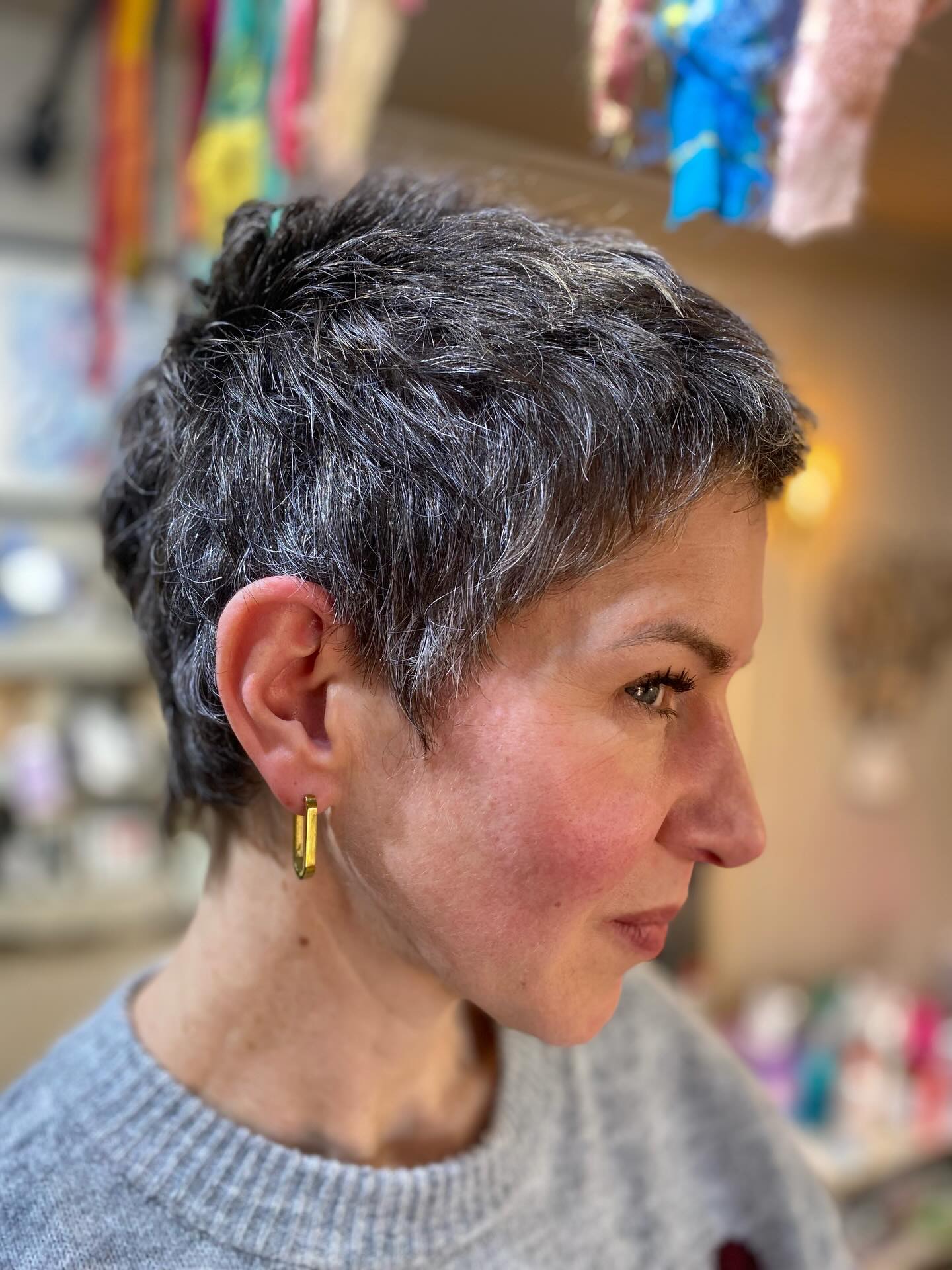 Sleek Salt-and-Pepper Layered Pixie